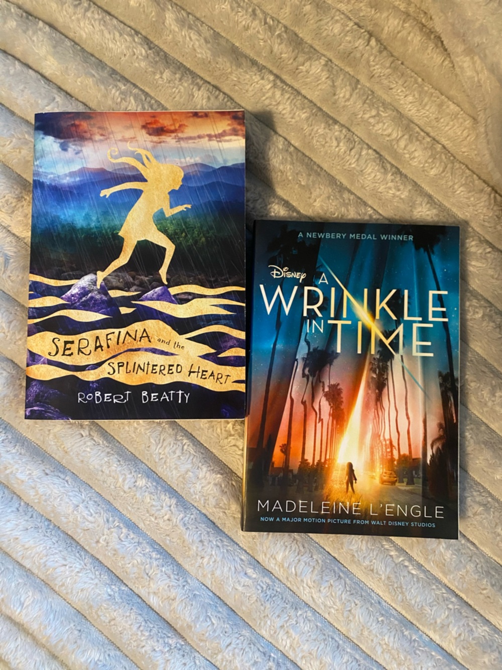 A Wrinkle in Time and Serafina and the splintered heart-Scholastic